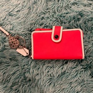 Pink coach wallet with charm